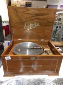 A good quality modern Edelweiss table top polyphon with discs
 
All teeth on both combs are in