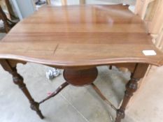 A mahogany occasional table