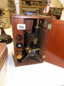 A cased microscope
 
This is in good condition
Case is commensurate with age/usage and is hand