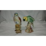 A Beswick hawk No.2316 and a Beswick green parrot, No.930
 
Both undamaged
Both with impressed