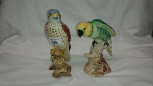 A Beswick hawk No.2316 and a Beswick green parrot, No.930
 
Both undamaged
Both with impressed