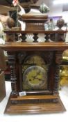 An oak 19th century 8 day mantel clock