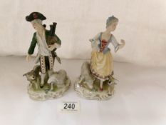 A pair of 19th century continental porcelain figures,