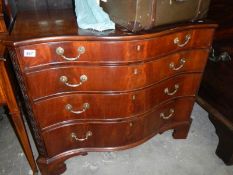 A mahogany serpentine front chest of drawers
 
This is in fair condition with a number of scuffs &