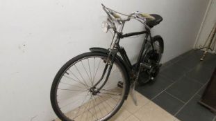 A 1952 cyclemaster in a Gent's Triumph bicycle - reg no KAA118, R.F.60 registration book, 4 tax