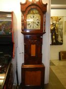 An 8 day oak cased Grandfather clock by Wm Harrison, Hexham
 
30 hour movement with a face that