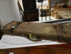 An old leather gun case
 
This is in sound condition
Soiling & scuff commensurate with age &