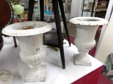 A pair of Victorian garden urns
 
These are cast iron