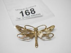 A 9ct gold dragon fly brooch
 
This weighs 5gms