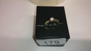 A yellow gold diamond solitaire ring, size M