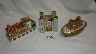 3 Royal Crown Derby paperweights, train, boat and castle
 
This is in good condition with no