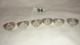 6 unmarked silver Masonic 'sample' style rings, approx. 26 grammes