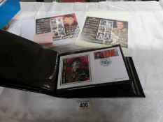 A folder of limited edition Benham 'Elvis' covers and 3 mint stamp presentation (96/150 sets only)