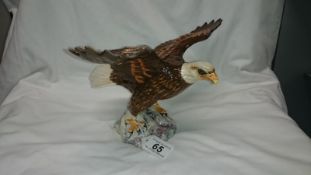 A Beswick Golden Eagle, No.1018