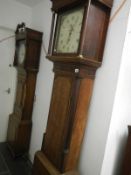 A square dial oak and mahogany Grandfather clock
 
There is no name on face