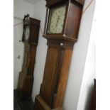 A square dial oak and mahogany Grandfather clock
 
There is no name on face