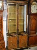 An Oriental style inlaid cabinet