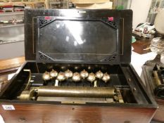 A Victorian music box with 9 bells
 
Shortest tooth is missing
Bell motion works but some