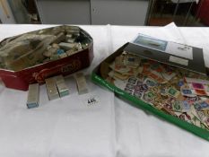A tin and tray of mainly UK stamps