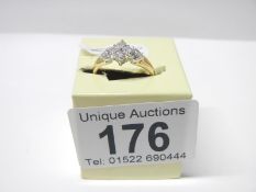 A 6 stone yellow gold floral diamond ring, size P