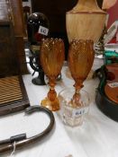 A 19th century cut glass tea bowl and a pair of amber glass vases