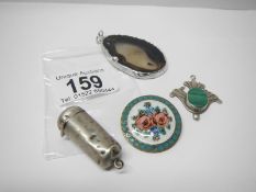 An enamel brooch, a malachite pendant, a silver agate pendant and a silver cheroot holder