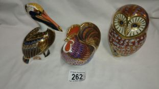 3 Royal Crown Derby paperweights, cockerel, brown pelican and owl
 
This is in good condition with