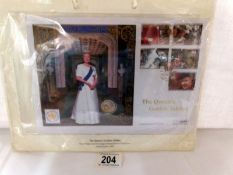 A Queen's Jubilee limited edition gold Sovereign commemorative coin cover