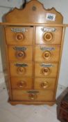 A set of spice drawers
 
These are circa 1940’s
