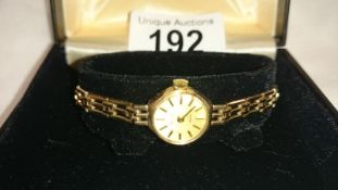 An all 9ct gold Accurist wrist watch (boxed)