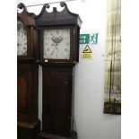 A mahogany mood dial Grandfather clock
 
30 hour non chiming movement
Pendulum has feather intact