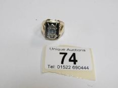 A 9ct gold Masonic ring set sapphire in onyx, approx.