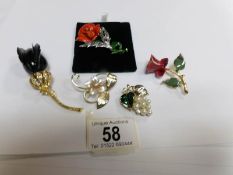 3 rose brooches and 2 others