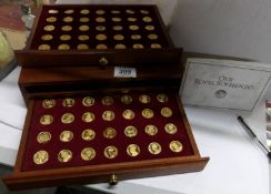 A cased full set of 70 'Our Royal Sovereigns' commemorative coins