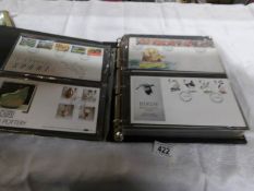 2 folders of first day covers, regional and definitive covers,