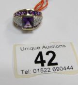 A 9ct gold ring set amethyst and pave' diamonds,