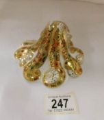 A Royal Crown Derby paperweight, Octopus, gold signature edition, No. 333
 
This is in good