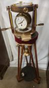 A John Barlow's Vernier Asimuth Compass navigator comprising compass, barometer, 24hr clock,