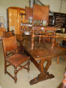 An oak refectory table and 6 chairs
 
Length approximately 181.5cm
Width approximately 74.25cm