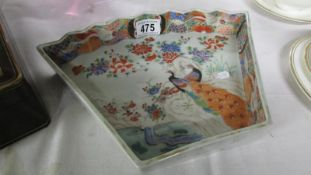 A 19th century Oriental peacock hand painted dish