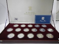 A 16 piece Royal Marriage commemorative coin collection, boxed and with book
