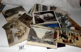 A quantity of old postcards