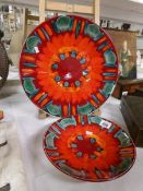 A large Poole pottery charger and a smaller matching example
 
Small plate 10.5” diameter
No