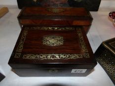 An early 19th century rosewood and brass inlaid jewellery box
 
Hinge has slight movement