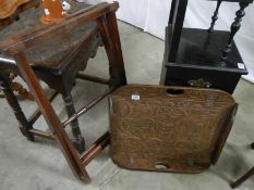 A late 19th century carved butler's tray on stand