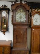 A mahogany cased Grandfather clock by W Flather, Halifax
 
30 hour movement, made to look like