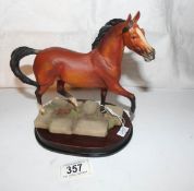 An Aynsley model of a racehorse