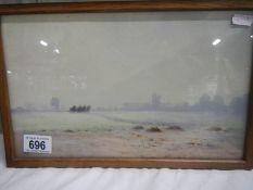 A framed and glazed watercolour ploughing scene signed W B Thomas