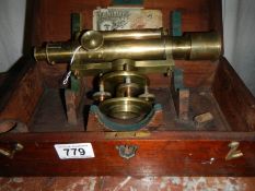 A standard size surveyor's level by T B Winter of Newcastle with staff head mount,