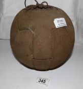 A vintage football
 
Approximate circumference is 69.25cm